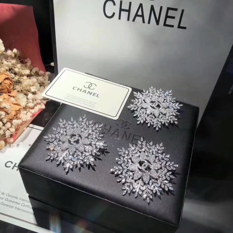 Ch*el brooches